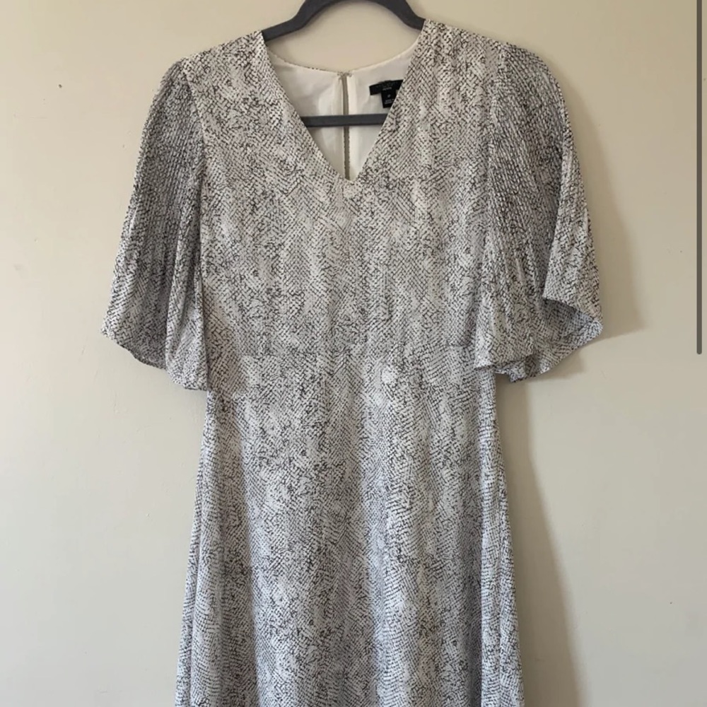 Black and white flowy Ann Taylor at the knee Dress